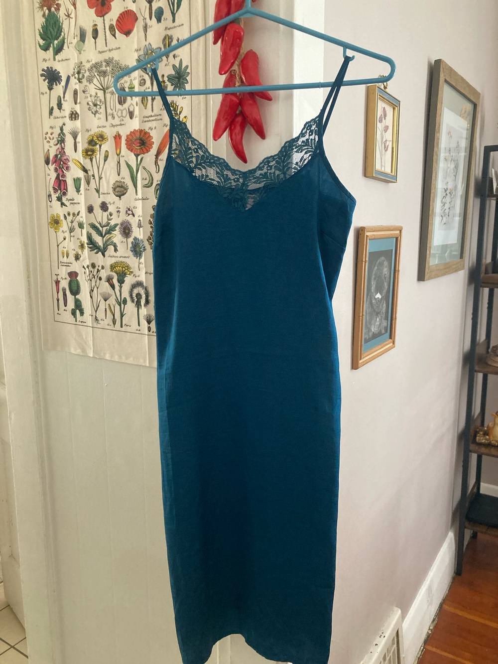 Teal blue slip size xs lace and elastic trim on upper back
